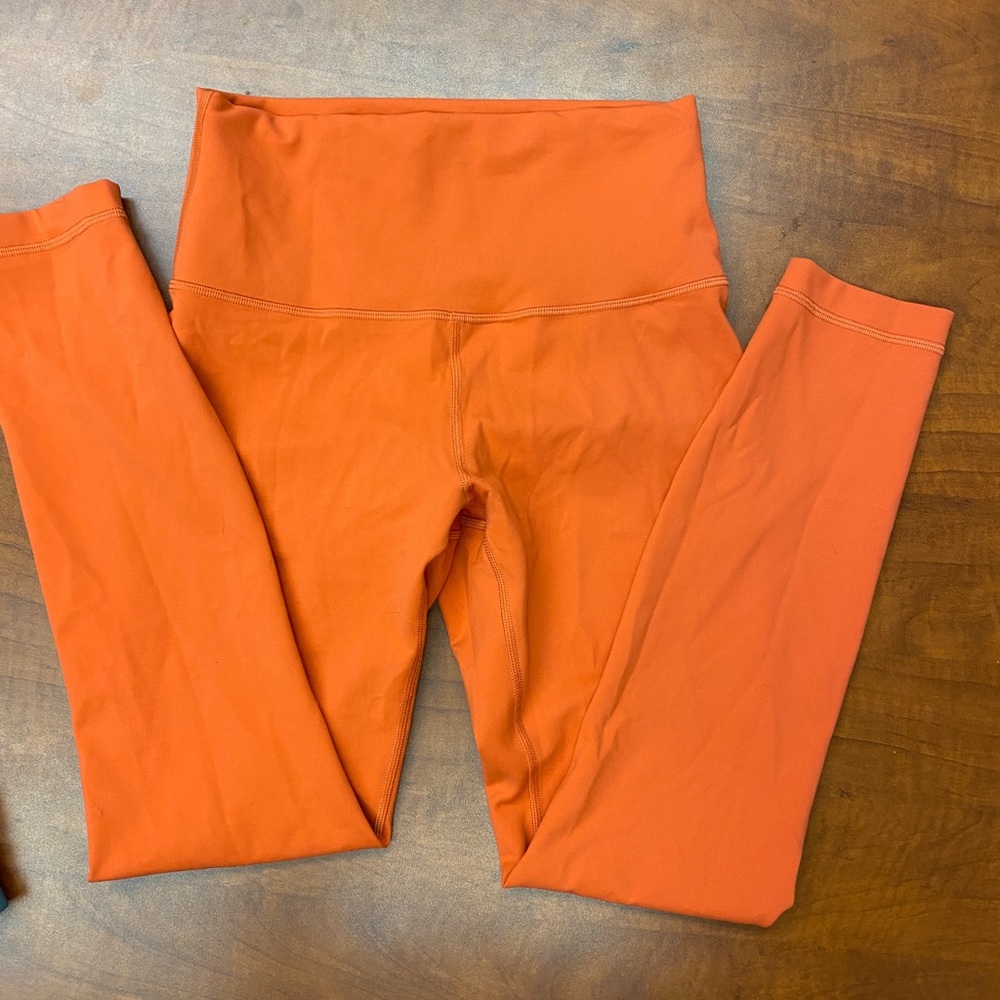 Lululemon Wunder Train High-Rise Tight 25" size 6 Brick